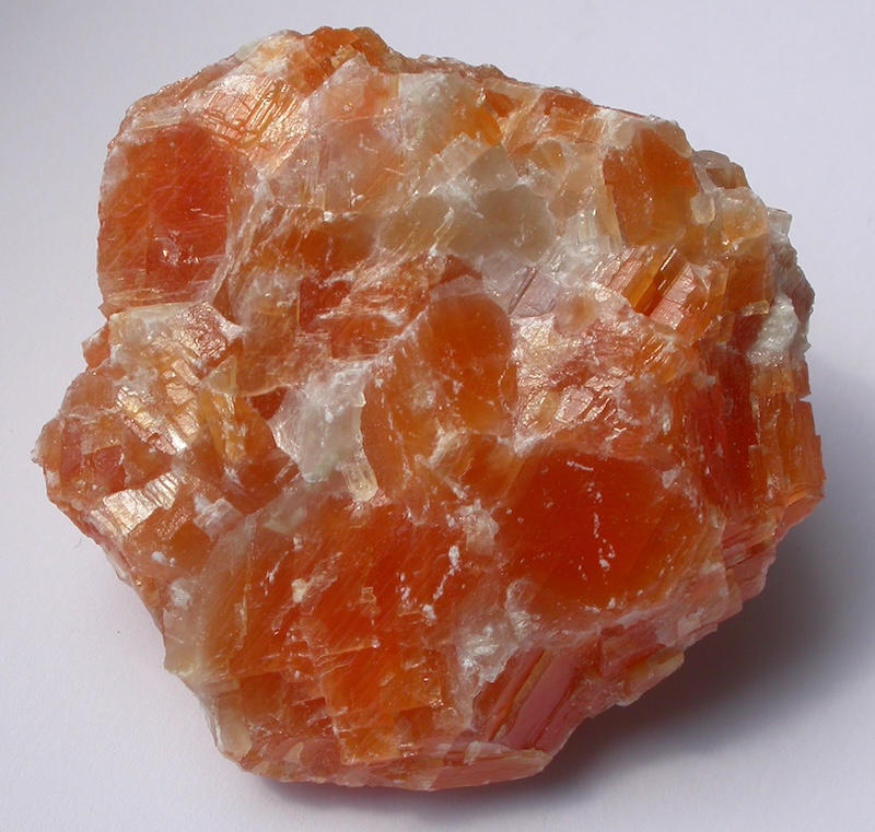 A piece of raw orange calcite