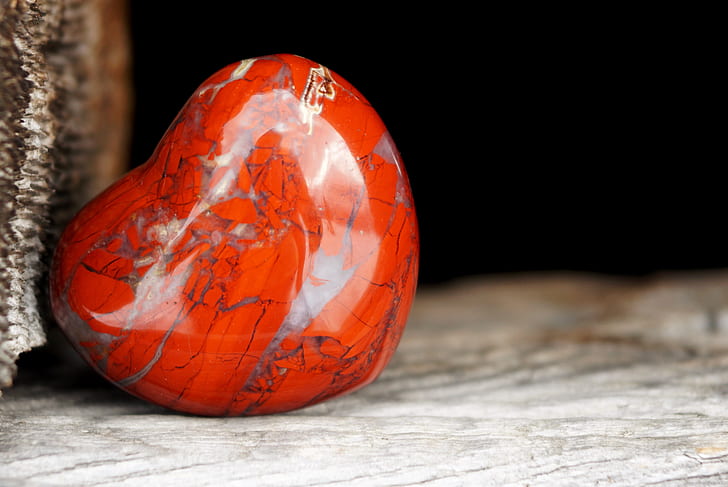 A heart-shaped red jasper gemstone