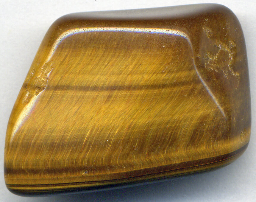 A polished tiger's eye quartz gemstone