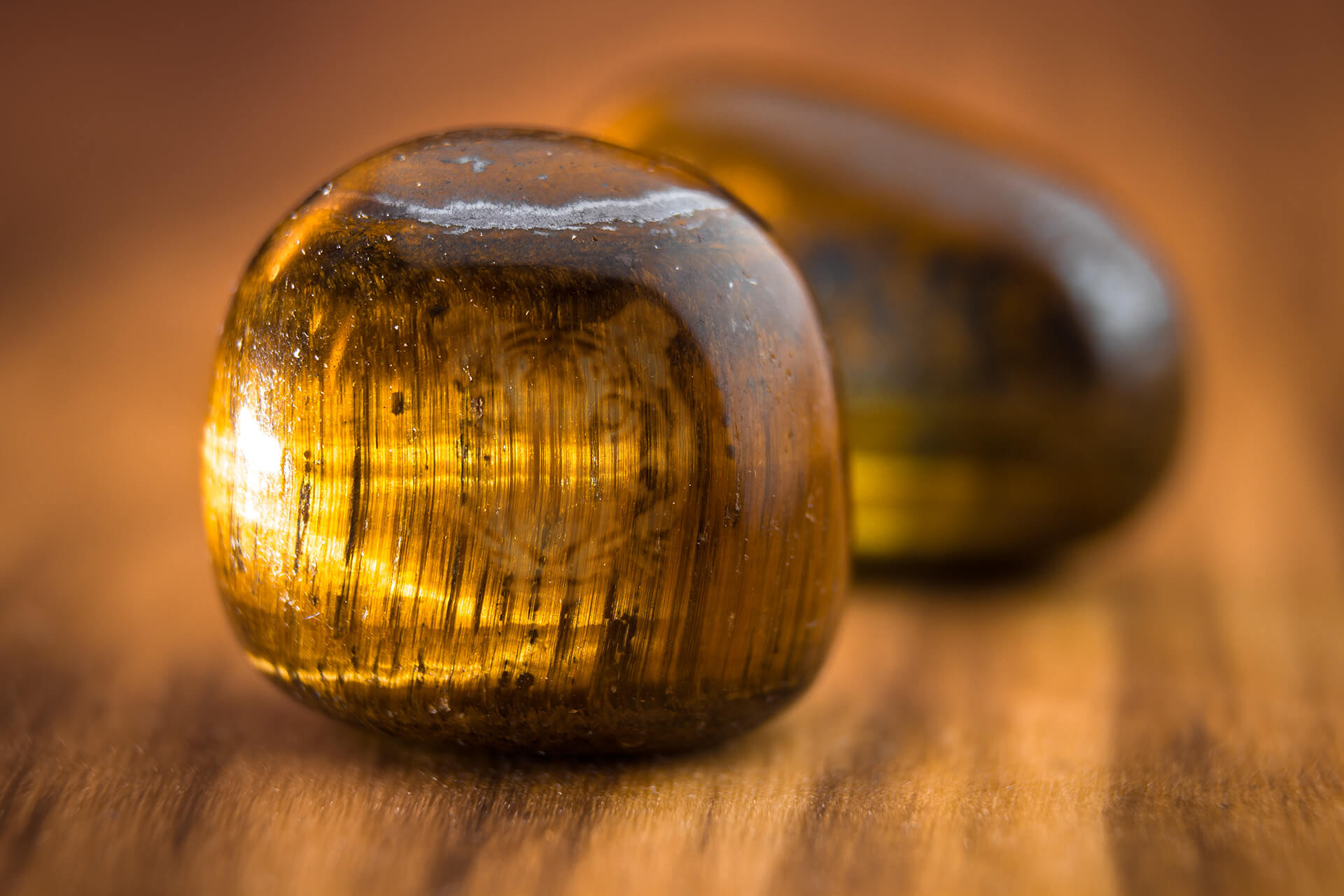 Tiger's eye stone properties shown in a macro photography image.